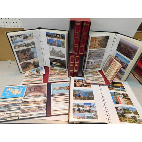 Large collection of postcards in albums