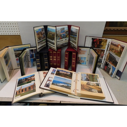 Large collection of postcards in albums