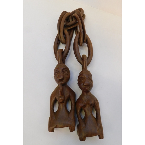 478 - Carved wooden fertility artefacts