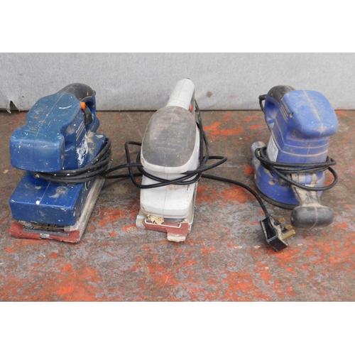 15 - Three electric sanders - all W/O...