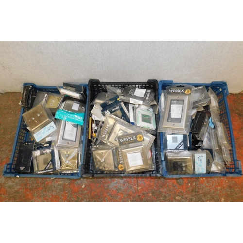 38 - Three boxes of light switches etc....