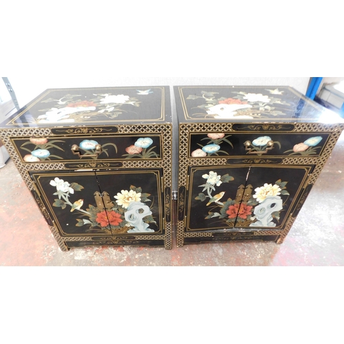 53 - Pair of oriental matching lacquered cupboards with drawers...