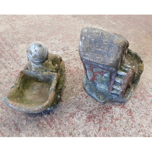 48 - Two weathered stoneware garden ornaments - water wheel and one other