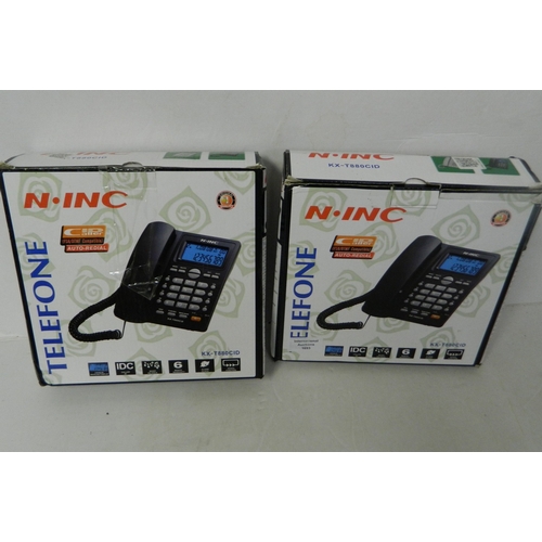 683 - Two N-Inc telephones - boxed/W/O