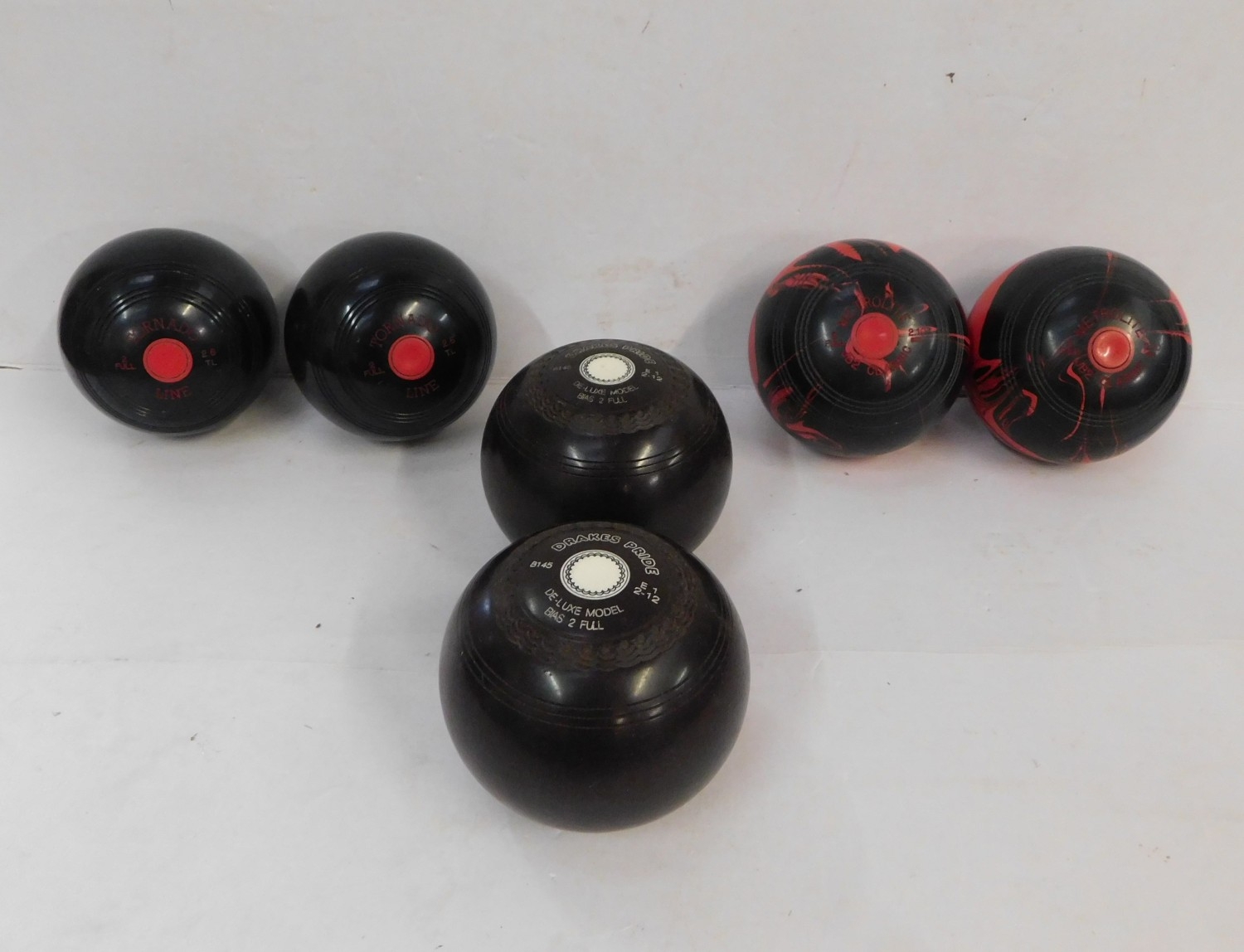Three pairs of Crown green bowls