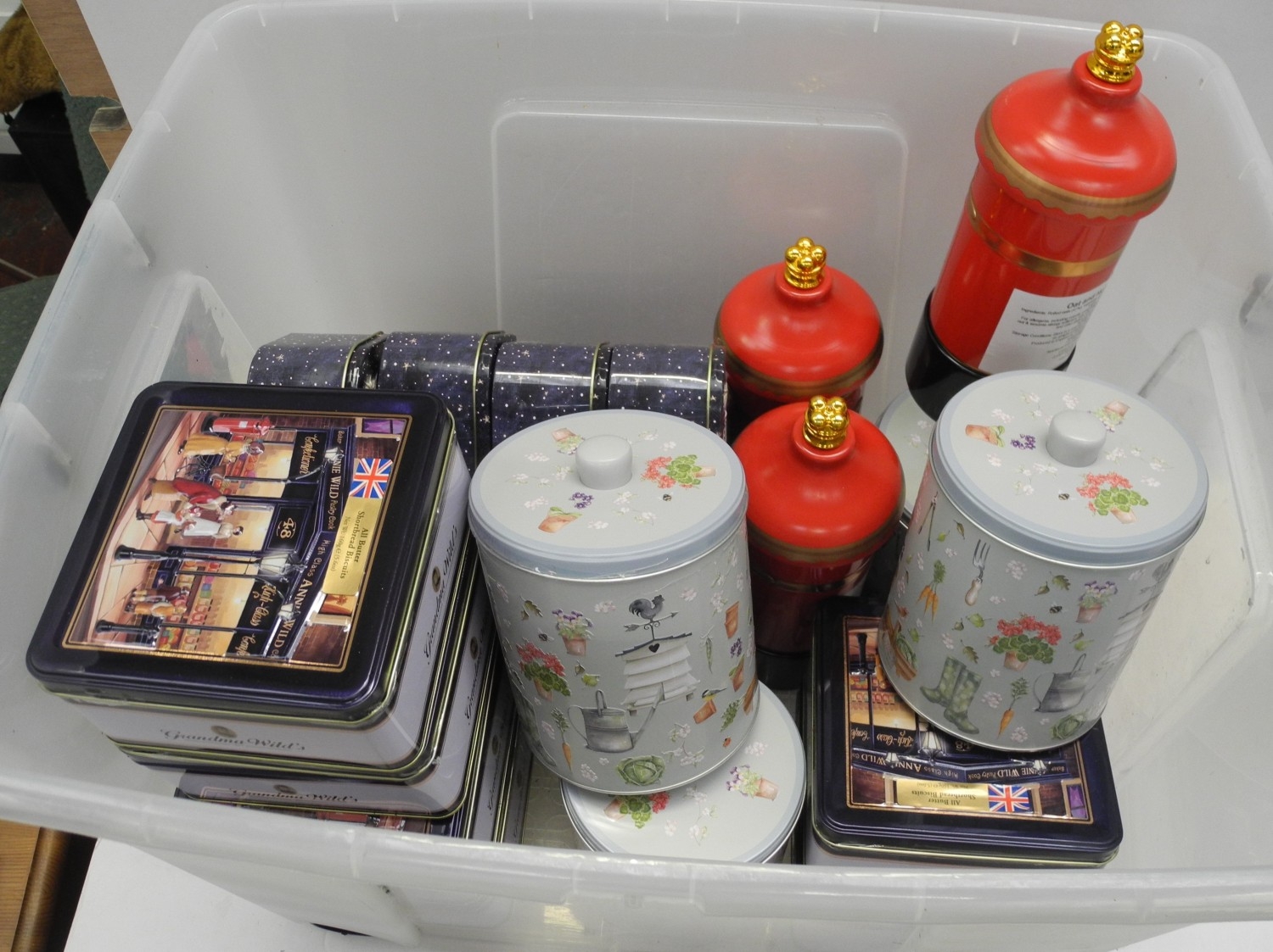 Collection of empty Christmas related biscuit tins