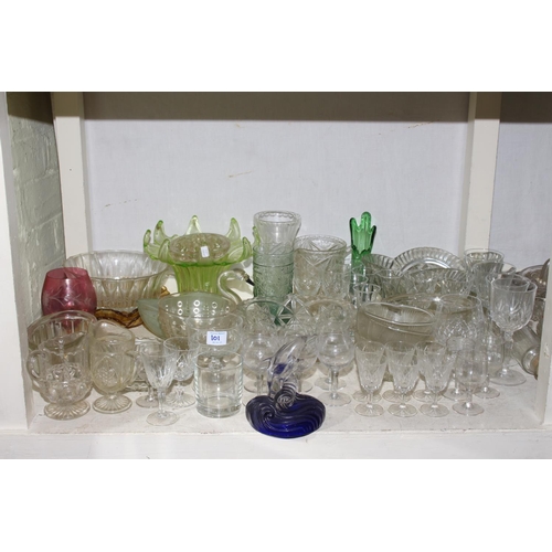 101 - Collection of clear and green glassware including vases, decanters, bowls, etc.