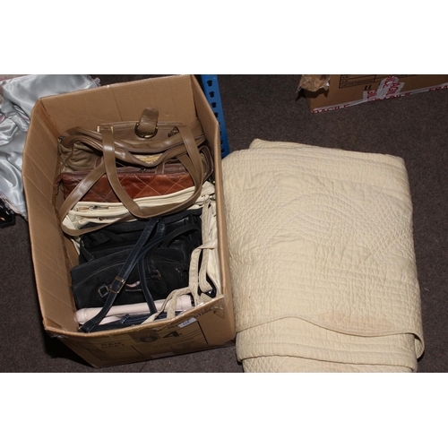 115 - Six boxes of lace and linen, Durham quilt, Paisley throw, head scarfs, Glenalmond tweed bag, clothin... 