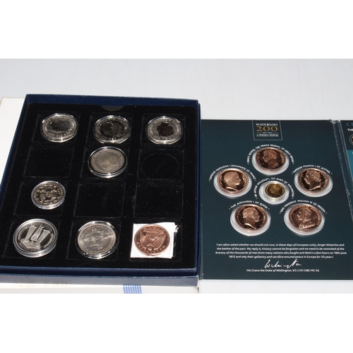 143 - Three coin boxes containing 1822 Geo. IV Crown, 3 x 1oz .999 silver coins, seventeen £5 coins, set o... 