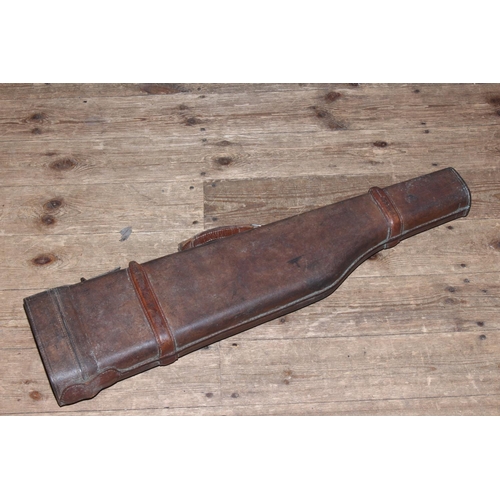 151 - 19th Century leather leg of mutton gun case, 75cm long.