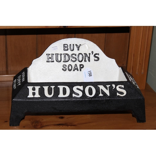 158 - Cast metal 'Buy Hudsons Soap' dog water bowl, 40cm wide.