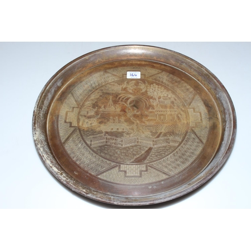 164 - Oriental etched metal circular tray and carved hardwood Chinese dragon tray.