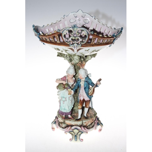 178 - Ornate porcelain table centre piece with musician and maiden, 39cm