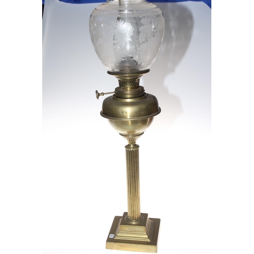 182 - Brass column oil lamp, having brass reservoir and etched glass shade.