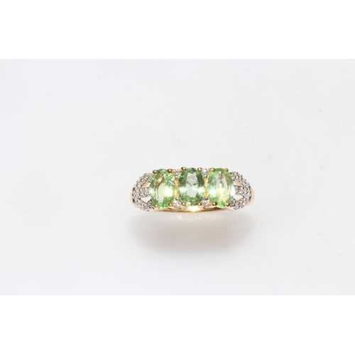 252 - Tourmaline and diamond 18k yellow gold ring having three tourmaline and thirty two small diamonds, s... 