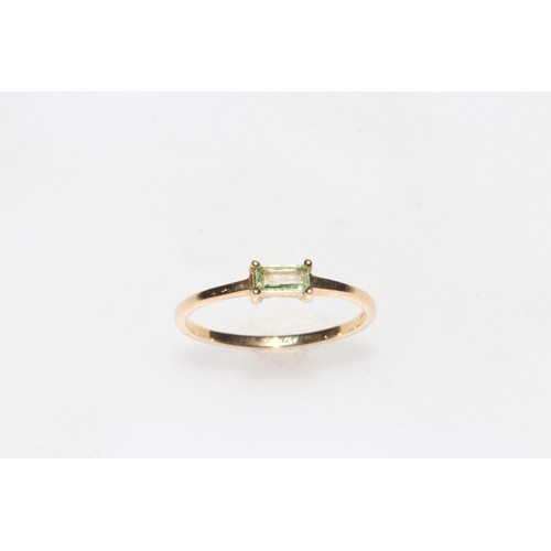 258 - 9 carat yellow gold and baguette tourmaline ring, size Q, with certificate.