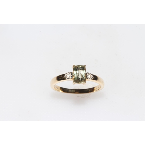 259 - 10 carat yellow gold Csarite and Zircon three stone ring, size P/Q, with certificate.