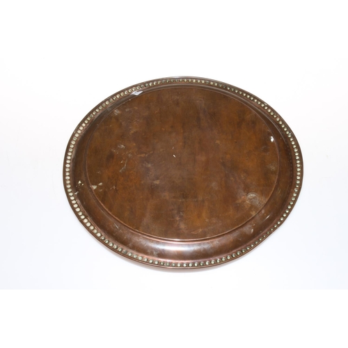 287 - Copper 'Royal Gordon Highland Whisky' tray, 30.5 cm diameter. Rubbed from cleaning