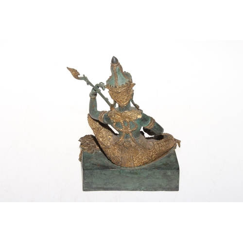 290 - Gilt bronze Deity, 18cm.