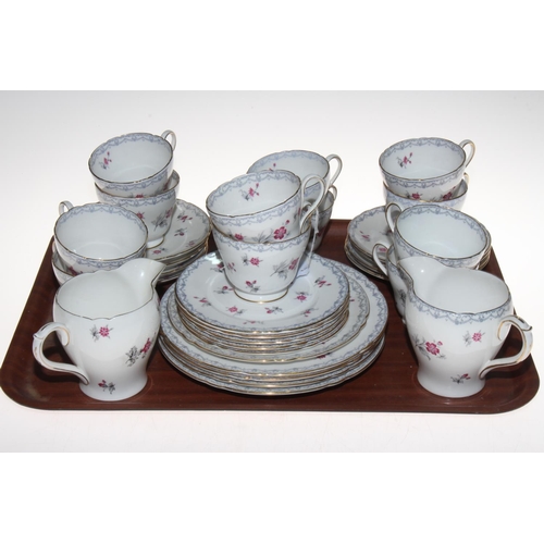 31 - Shelley 'Charm' 13756 thirty two piece tea set, three size of side plate and jug without rim decorat... 