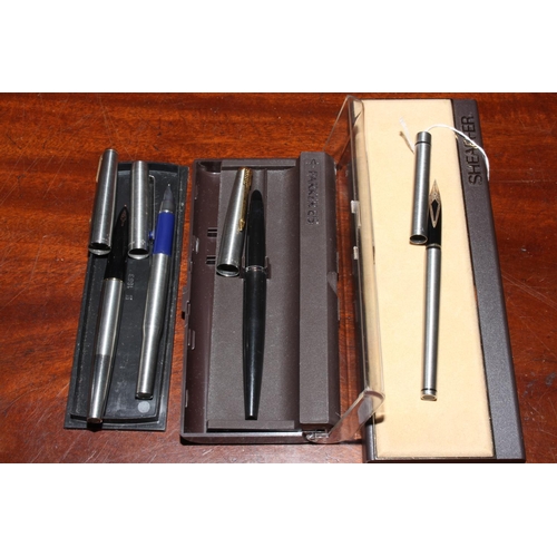 334 - Three Parker and Sheaffer fountain pens.