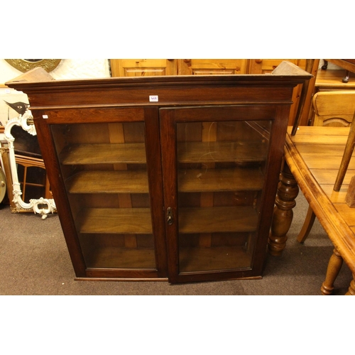 409 - 19th Century mahogany bow front two door corner wall cupboard, glazed two door bookcase top, sewing ... 