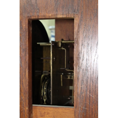 464 - 1920's Oak double weight longcase clock, 211cm high. Condition: Pendulum door warped.