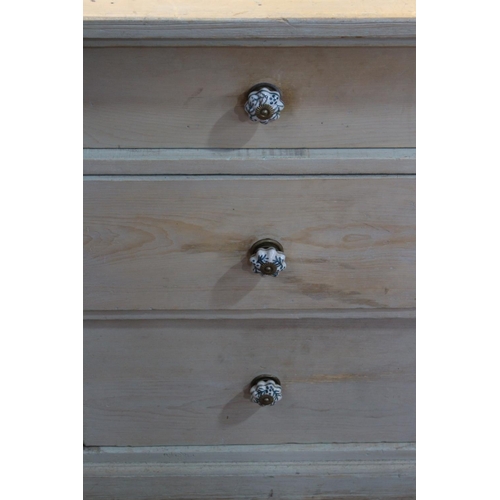 486 - Antique stripped pine seven drawer dresser and rack, the rack adapted to be wall mounted, the dresse... 