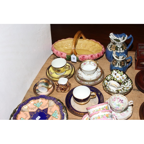 52 - Collection of decorative china including cabinet cups and saucers, Sarreguerines flower basket, etc.