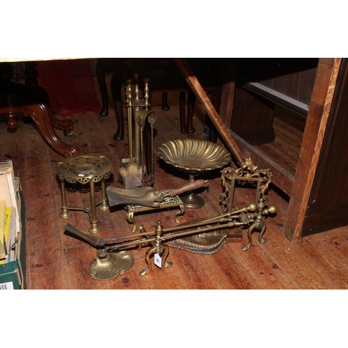 58 - Brassware including ornate easel photograph frame, inkstand, trivets, fire irons, etc.