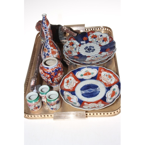 7 - Three 19th Century Imari plates, two vases, three tiny vases and carved wood piece (9).