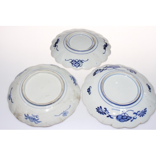 7 - Three 19th Century Imari plates, two vases, three tiny vases and carved wood piece (9).