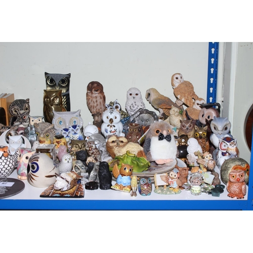 87 - Large collection of owl ornaments, plates, bookends, soft toys, etc.