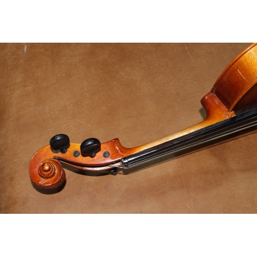 161 - Two cased violins with bows (one 3/4 size).
Condition - 3/4 violin in fairly poor condition.