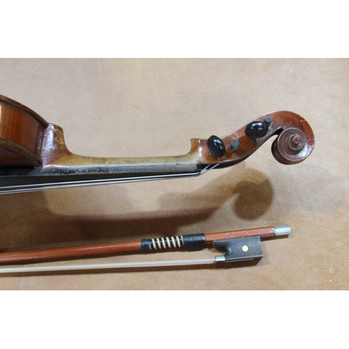 161 - Two cased violins with bows (one 3/4 size).
Condition - 3/4 violin in fairly poor condition.