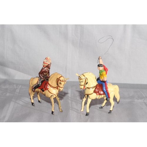 15 - DRGM US Zone Germany clockwork Tinplate Cowboy & Indian on Horseback.   Excellent (2).