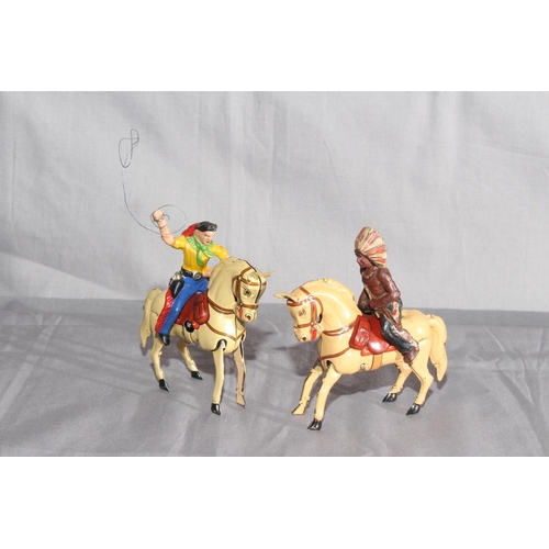 15 - DRGM US Zone Germany clockwork Tinplate Cowboy & Indian on Horseback.   Excellent (2).