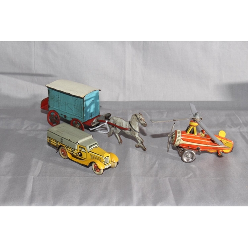 16 - DRGM clockwork Gyro Copter, Tipp Co small Truck and early Horse Drawn Penny Toy.   Very Good to Exce... 