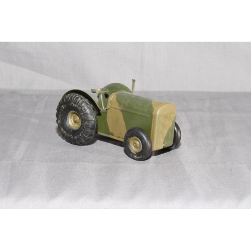 29 - Triang Minic 83M CF clockwork tinplate Farm Tractor.  Excellent unboxed, clockwork motor works.