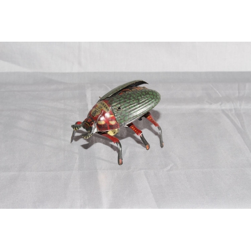 4 - Lehmann clockwork Beetle.   Original paint.   Excellent clockwork motor works.