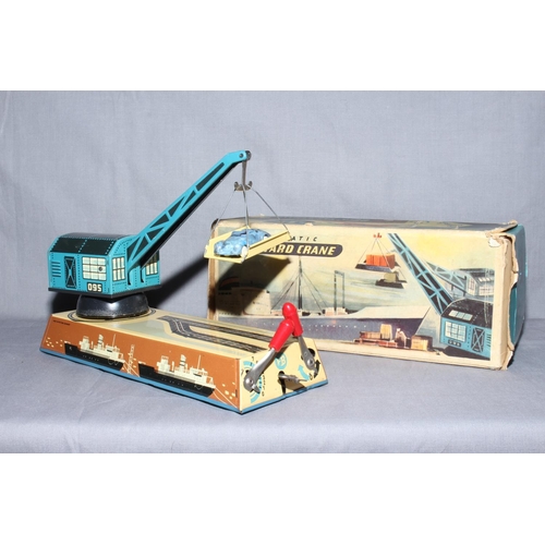 46 - Biller West Germany clockwork tinplate Dock Yard Crane, complete with plastic car and cradle.   Near... 