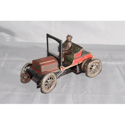 5 - German tinplate clockwork 2 Seat Car.   Original paint with wear and minor surface corrosion.   Good... 