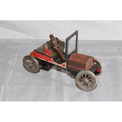 5 - German tinplate clockwork 2 Seat Car.   Original paint with wear and minor surface corrosion.   Good... 