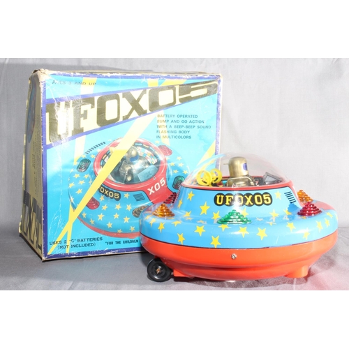 56 - TM Toys (Masudaya) battery operated tinplate Flying Saucer UFO X05.   Excellent in Good creased box.