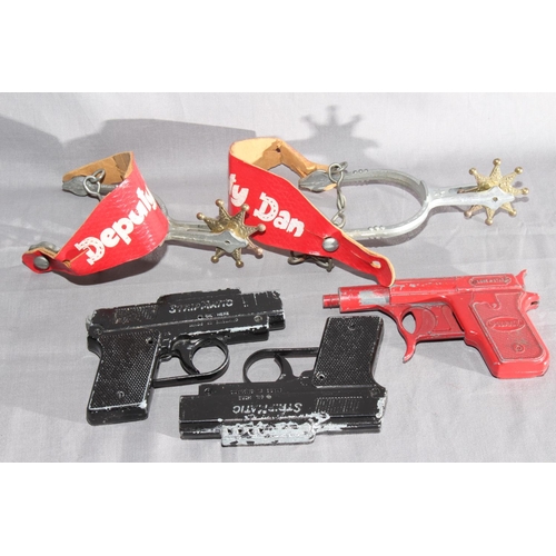 59 - Seven assorted unboxed Cap Firing Pistols including Lone Star Dan Dare plus a pair of Deputy Dan Spu... 