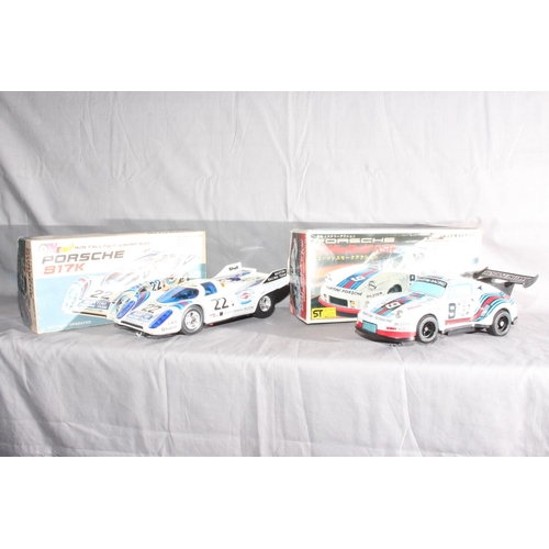 61 - Taiyo Porsche 917 Race Car and ST Toys Porsche 911.   Excellent in Excellent boxes.