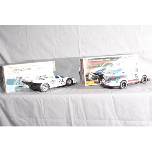 61 - Taiyo Porsche 917 Race Car and ST Toys Porsche 911.   Excellent in Excellent boxes.