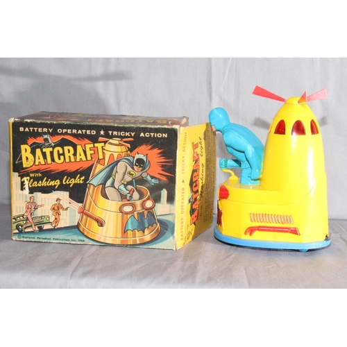 62 - Marx battery operated Batcraft with flashing light and tricky action.   Excellent in Very Good origi... 