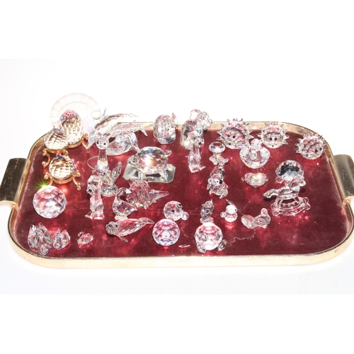 11 - Collection of small Swarovski crystal pieces.