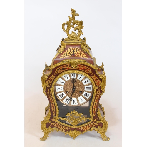 145 - Large decorative boullé style gilt metal moulded mantel clock, 57cm.